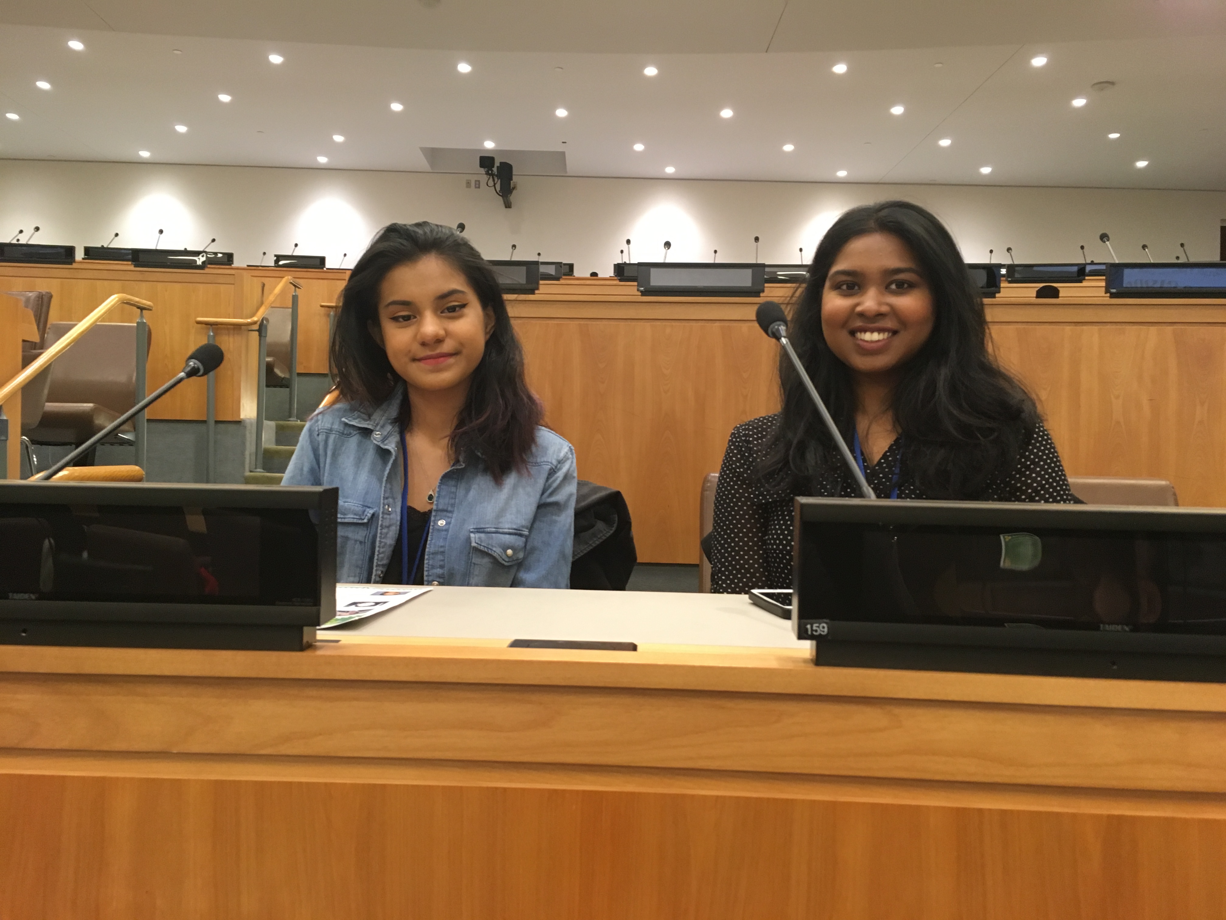 1. Yaritza Bustamante and Shristi Sookram awaiting the start of the Civil Society Briefing on Sustainable Practices Across Industries.